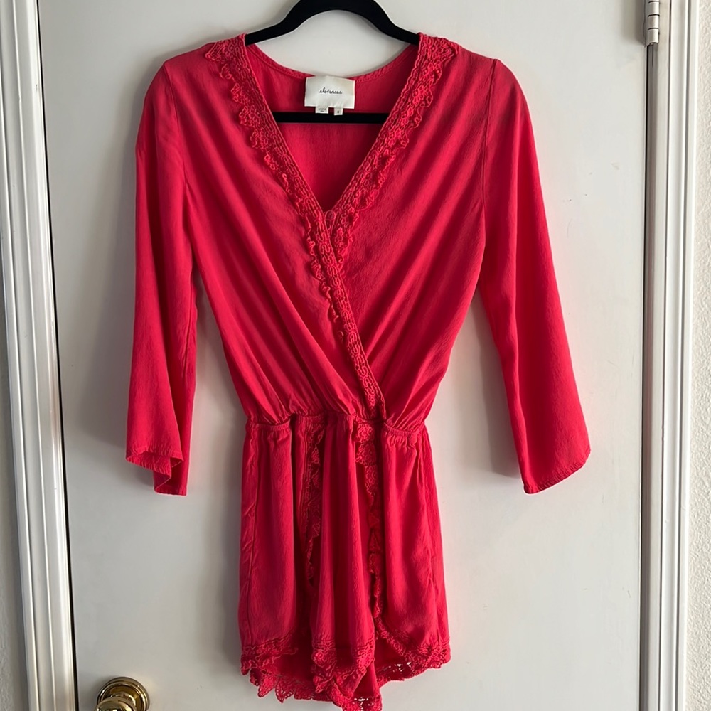 Anthropologie Elevenses romper with lace trim.